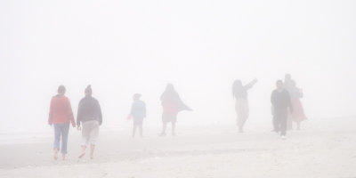 Beachcombers in the Mist