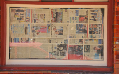 Newspapers Through the Window
