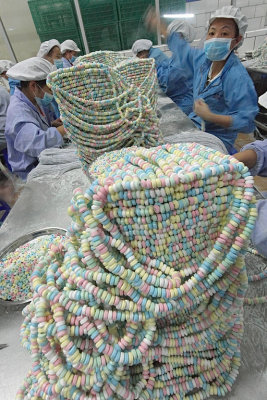 Chinese Workers Manufacture Wearable Candy For A Decadent West*Credit*