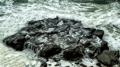 Waves over rock