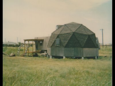 This assessor's Polaroid was taken from the northeast corner of the lot, looking southwest. Our former neighbors Susan and Phil called our little dome The Jewel on the Prairie. Pam S sent us a cross-stitch of a dome with the label Home Sweet Dome.