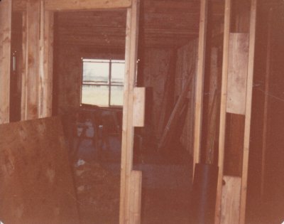 Looking from what would become our living room, through the new kitchen and out the new south window.