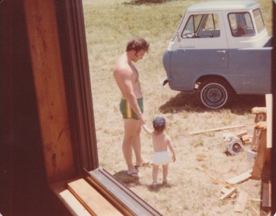 Our first neighbor and his child. They moved back to Ohio before we had a chance to get to know them.