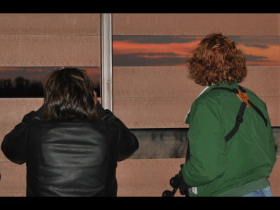 Deanne and Carla looking through the viewing slots on the observation deck.