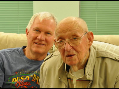 Grandpa Steve and Great-Grandfather Joe watch the young ones play