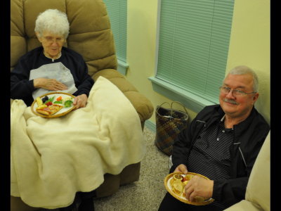 Great-grandma and Gerald enjoy some food and conversation