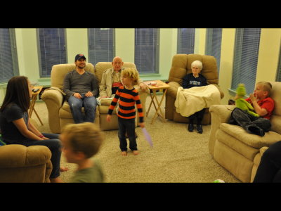 Pierce holds the stage for a moment while Catherine, Samuel, Seth, Great-Grandpa, Great-Grandma and Caleb look on.
