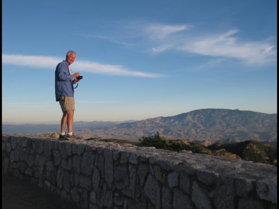 Steve taking a picture of the valley below from the road up Mt Lemmon
