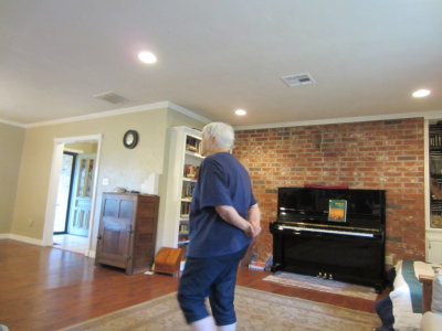 On Sep 7, we went to visit Heather and Jon and see their new home east of Shawnee. Jackie is measuring off the spacious living room.