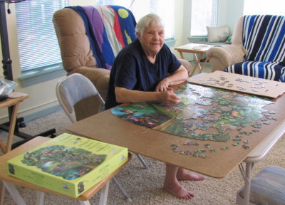 Back at the dome, Jackie is working yet another puzzle.