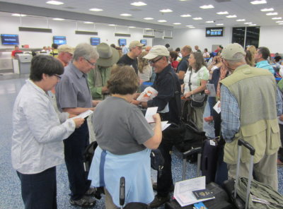 On Wednesday, March 16, 2016, we returned to the Miami airport to fly to Cuba.
CCT/Marazul had their person, Luis, there to help us get through customs.
Lorraine, John, Rich, Bob, Mary, Doug, Luis, Renee, Patti (behind Lou) and Lou in Miami airport