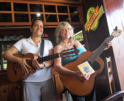 Carli posing with singer, guitar and CD
El Aljibe Restaurant, Havana, Cuba
March 16, 2016