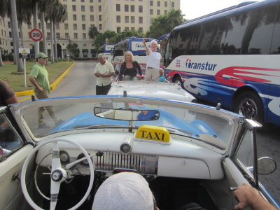 Saturday we toured Old Havana and Yuri surprised us
by starting the tour with a ride for all of us in classic taxis
We had so many pictures from the tour that I put all the pictures from the day in a separate gallery, but I left the classic car ride in this gallery.
March 26, 2016