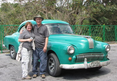 Mary and Steve
with 50s Pontiac in the parking lot
before leaving Hotel Mirador, Cuba