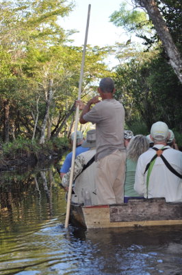 We loaded into two boats powered and maneuvered by two local men using poles to push us along.