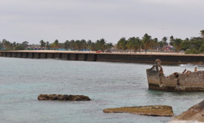 Looking back at the hotel behind the sea wall at Playa Giron, Cuba
