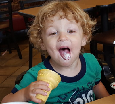 Usually Max just eats the cone, but today he tried it with a little ice cream--and showed us.