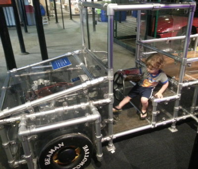 Max gives the gas to the transparent truck.