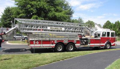 ...and the ladder fire truck takes off to lead the parade.