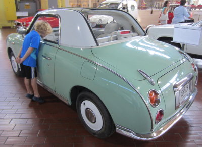 Pierce checks out the interior of another car.