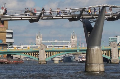 People Walking Over Tower Bridge