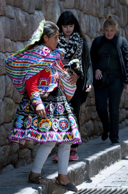 A Quechua Woman with a Baby Goat