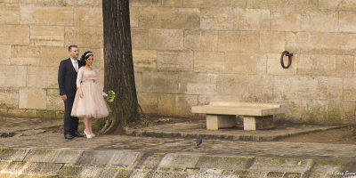 posing on the banks of the Seine
