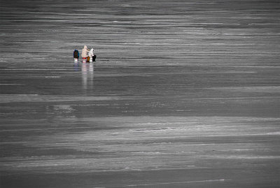 33. Fishing on frozen pond
