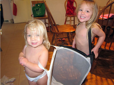 Now they are both wearing a laundry basket