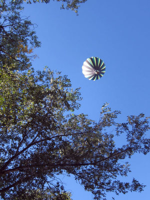 A balloon passes over our car