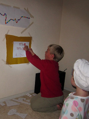 Simon prepares to stage a puppet show