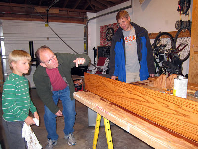 Simon is making a shelf for Annie (with help)