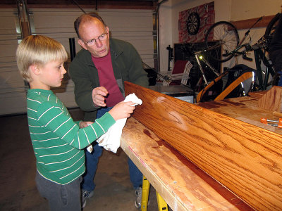 Papa advises on the staining process