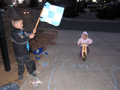 Simon manages driveway bike races