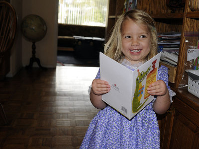 All smiles in her fancy dress.