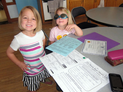 Now that she's 5, Kristina heads right to the elementary school to pre-register!