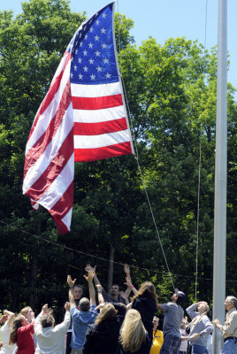 Raising the new flag