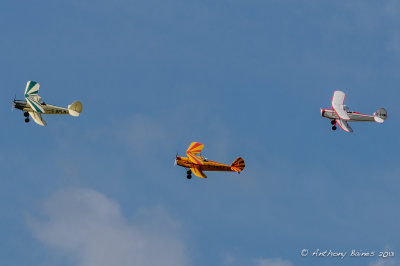 Formation of 3 vintage Stampe biplanes