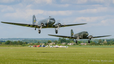 Two C-47 aircraft taking off