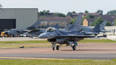 Dutch Demo team F-16 taxis in front of other aircraft at Fairford