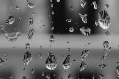 White fence in the rain(drops)