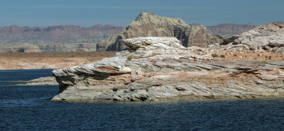 A Boat View Of Castle Rock And A View Of The Shoreline Of Lake Powell
