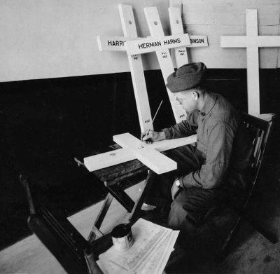 1918 - Painting names on crosses