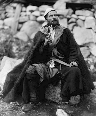 c. 1895 - Peasant with pipe and dagger