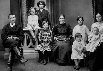 1916 - Country teacher with her family