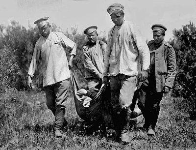 c. 1917 - Collecting the dead from the battlefield