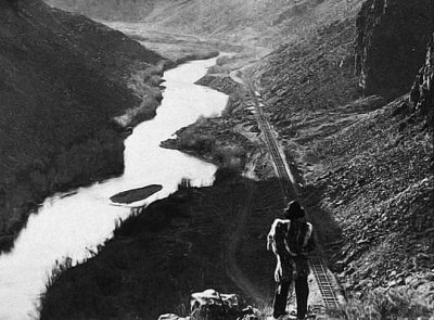 1868 - Native American observing the transcontinental railroad