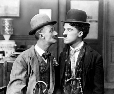 1915 - Charlie Chaplin with Ben Turpin in His New Job