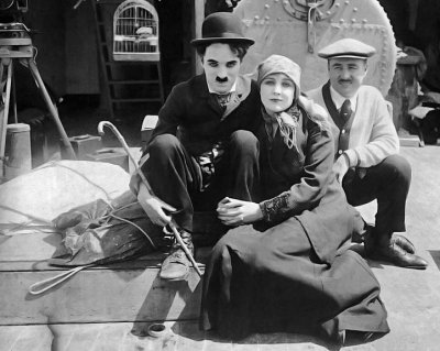 1917 - Chaplin with Edna Purviance and his half-brother Sydney