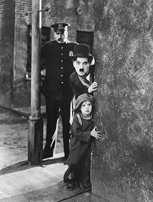 1921 - Charlie Chaplin and Jackie Coogan in The Kid
